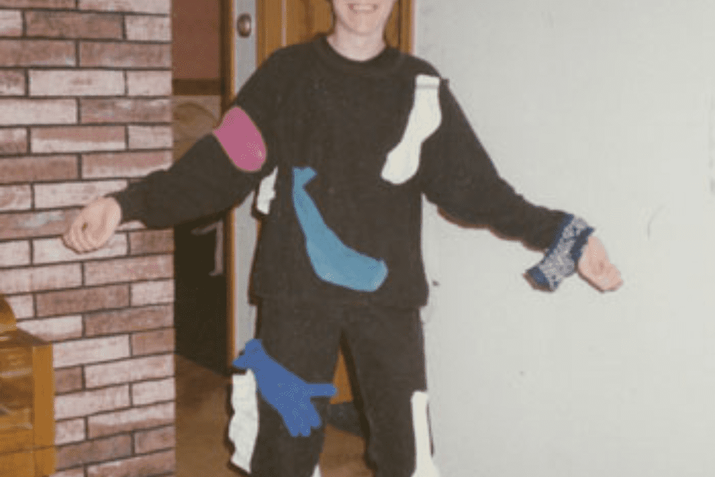 DIY Static Cling Halloween costume with dryer sheets and socks attached to clothing