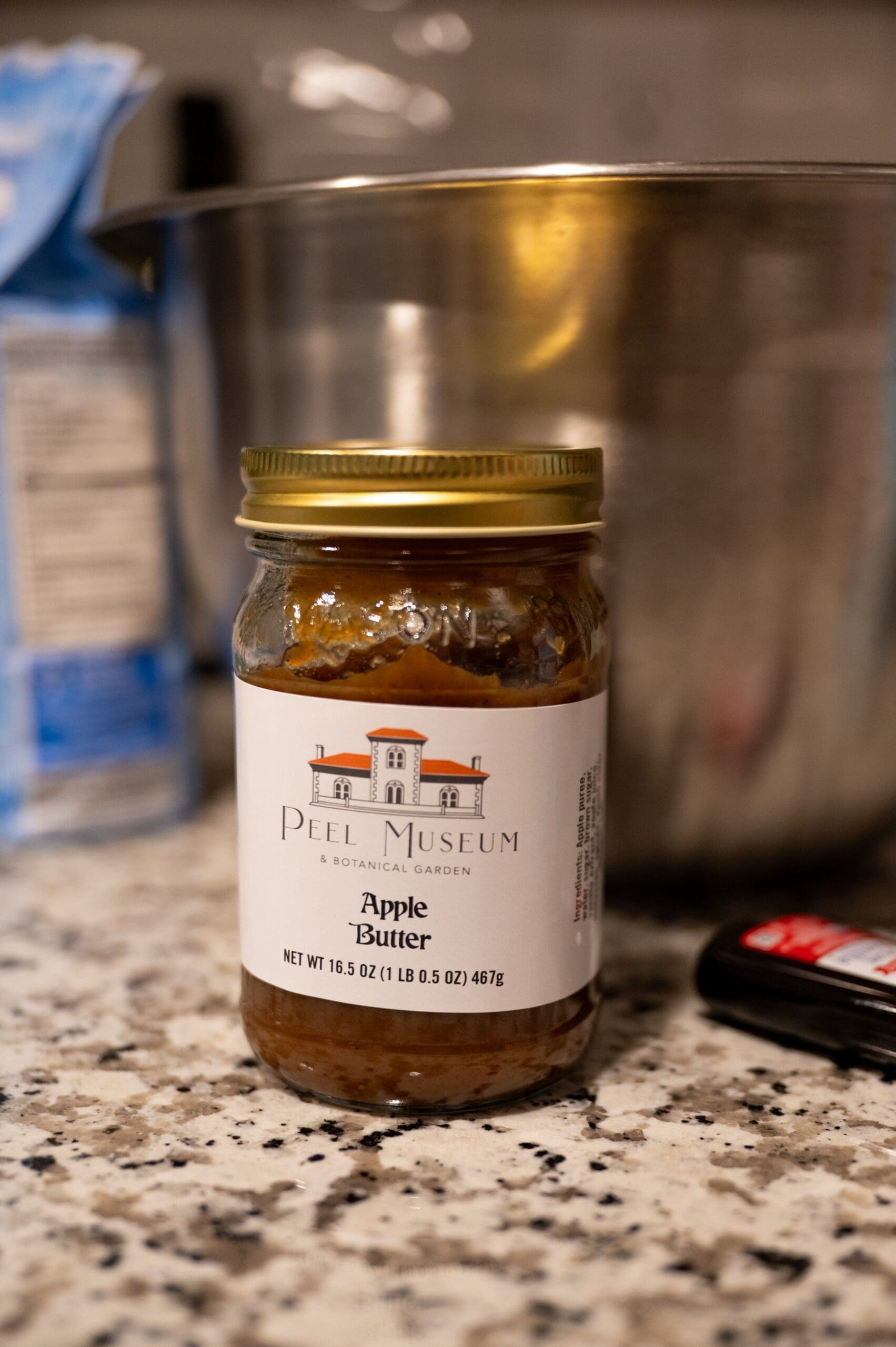 Jar of locally packaged apple butter from the Peel Museum Store