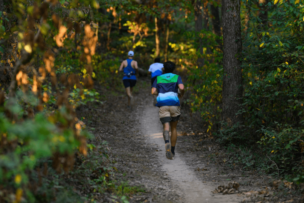 Classic 90s runner outfit with matching tracksuit and Oakley sunglasses costume inspiration