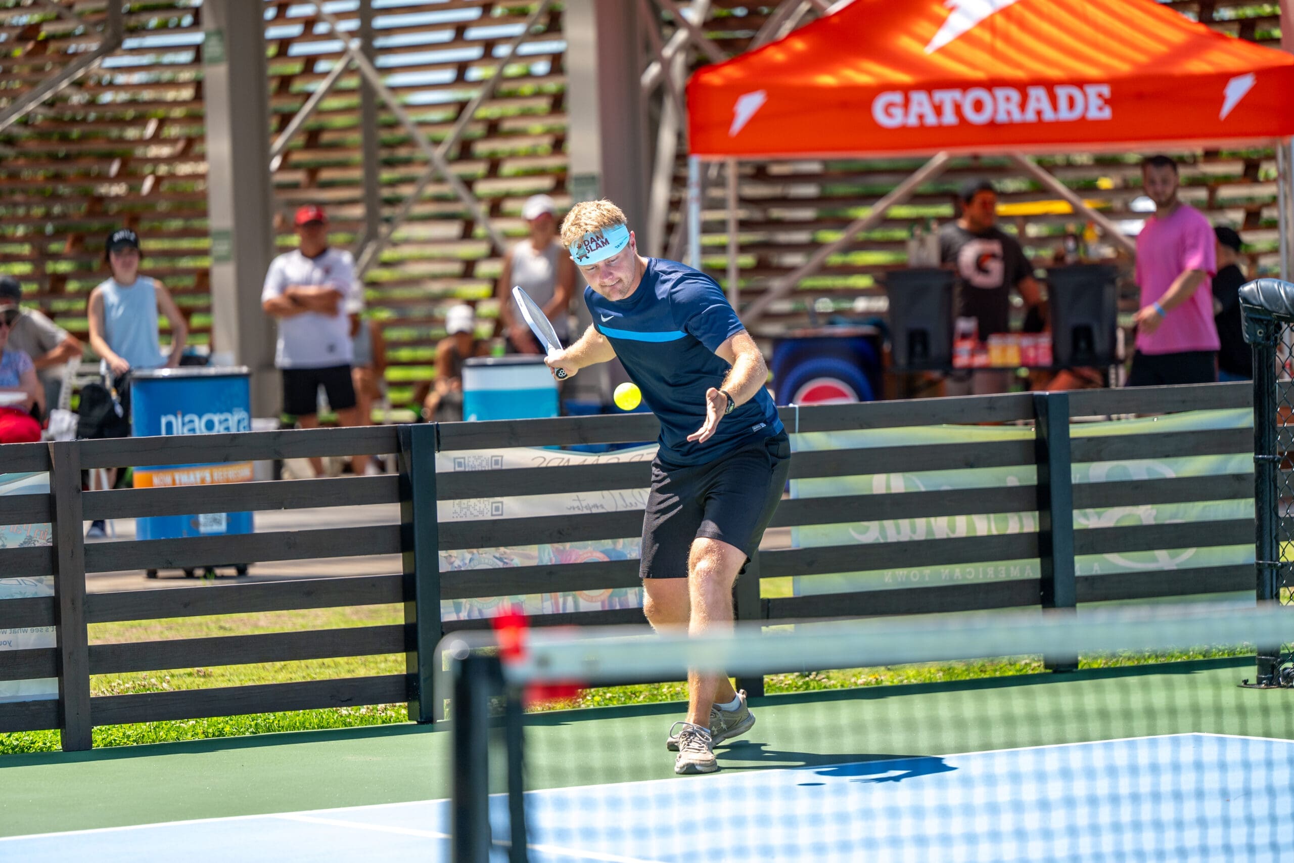 Woman shopping at Dr. Compton Native Tree & Plant Sale in Bentonville Arkansas